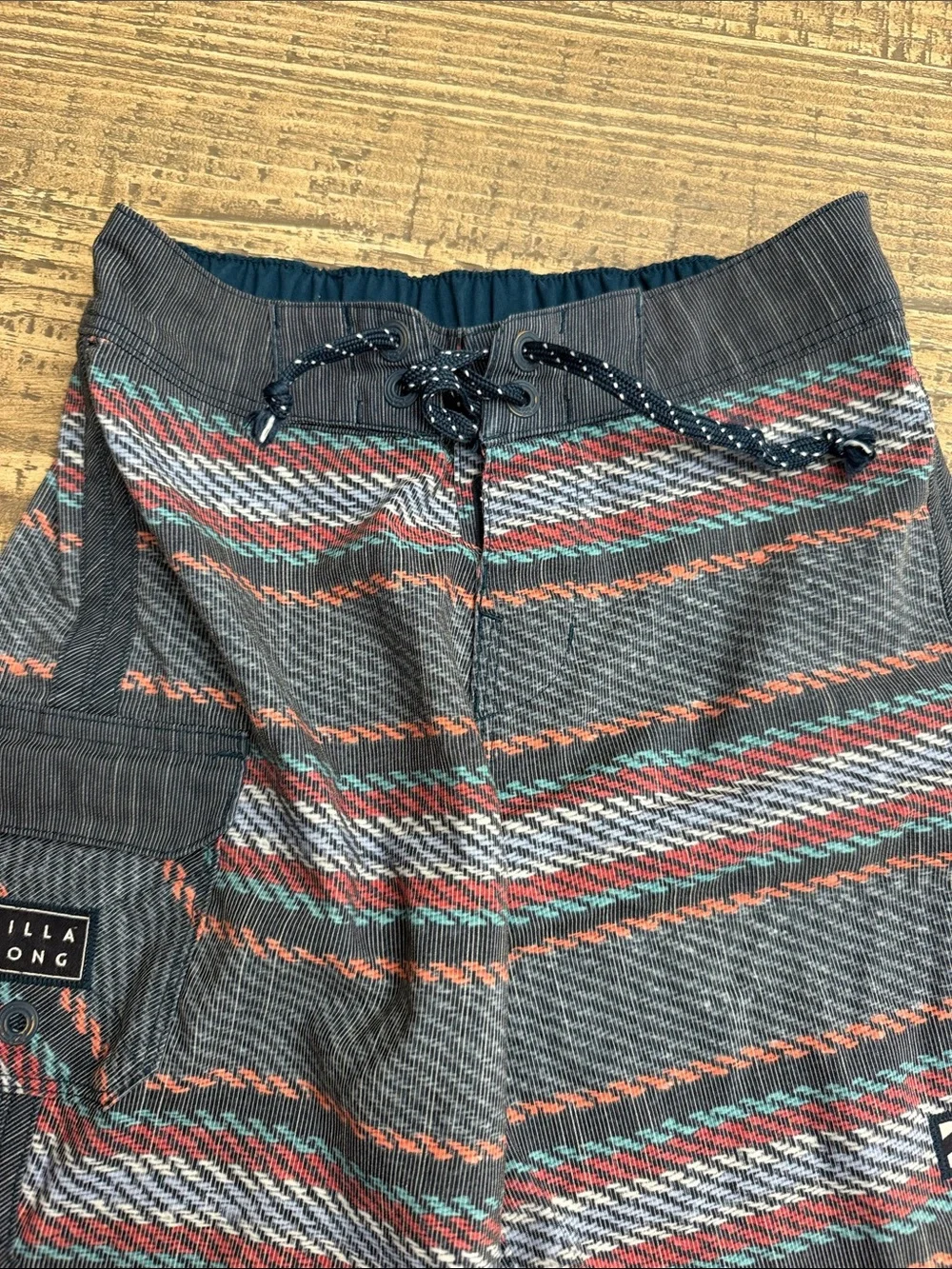 Billabong Kids Gray Swim Trunks with Red and Teal Stripes